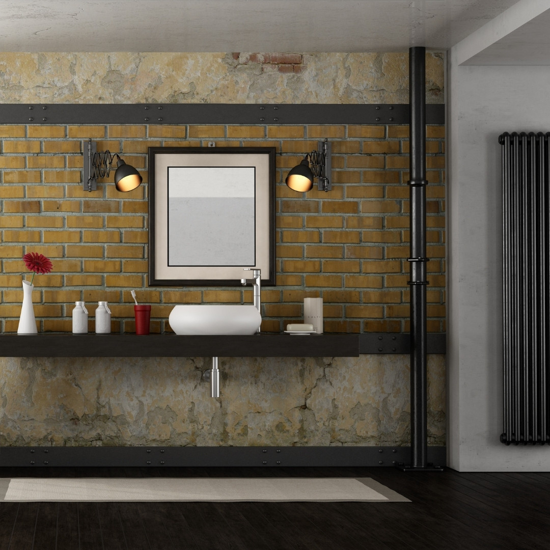 Styl loftowy uwielbia odsłonięte elementy instalacji - warto w nim pomalować rury na kontrastujący kolor, aby je wyeksponować